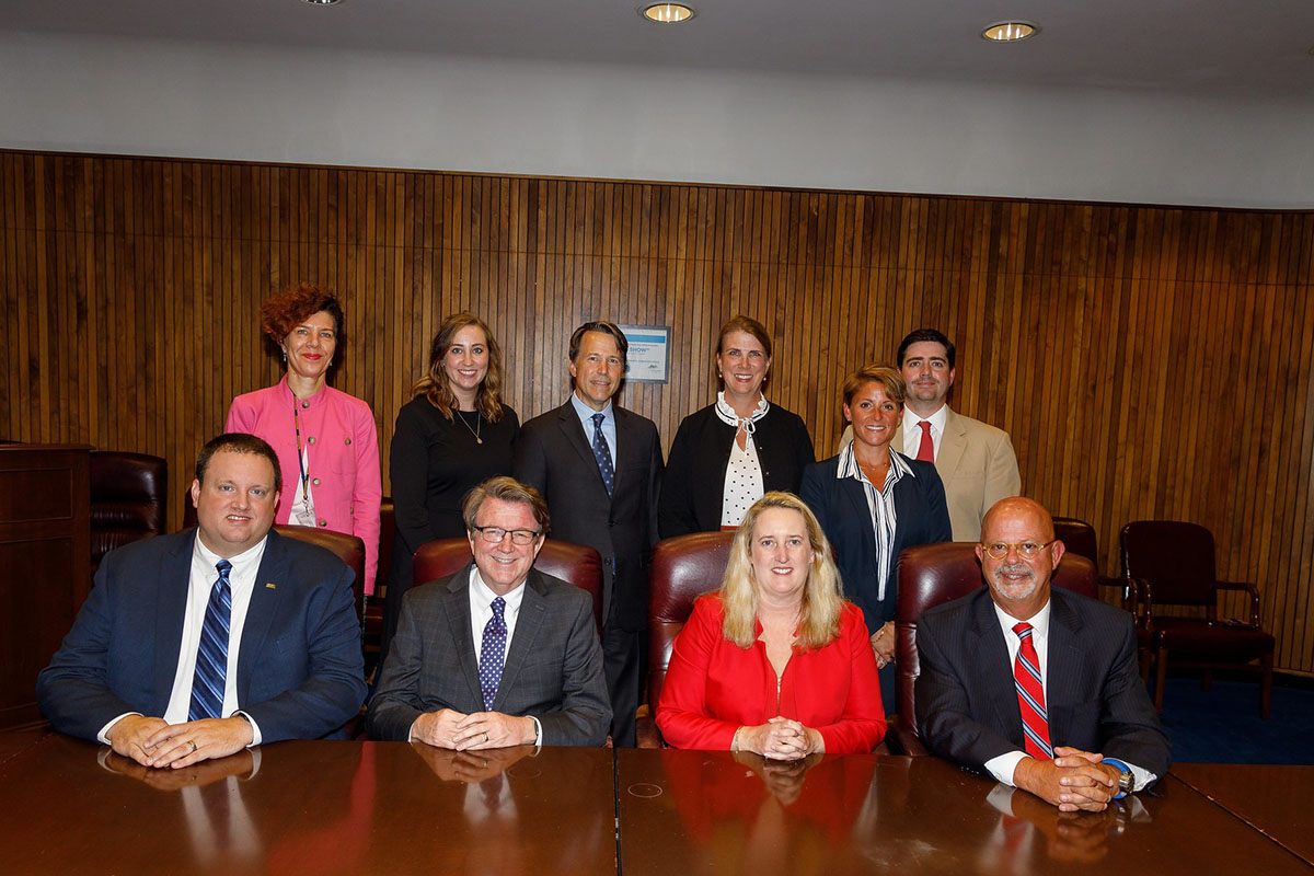Principle Deputy Assistant Secretary Loren Sweatt, USDOL-OSHA (seated, center), with representatives of USPPOULTY, NCC, NTF, and OSHA at the Alliance signing ceremony on September 4, 2019.
