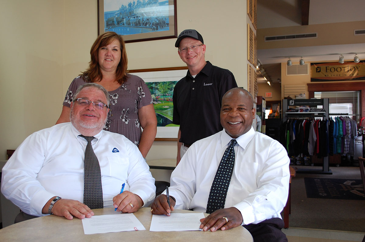 Seated: Lonnie W. Glen, GEAPS Great Plains Chapter President and Larry O. Davidson, Sr. , Area Director, Wichita Area Office. Standing: Barbara Grove, GEAPS Great Plains Chapter Past President and Steve Reed, GEAPS Great Plains Chapter Director