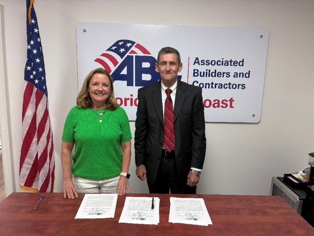 •	Left Standing – Karen Tucker Hoffman •	Right Standing - David (Scott) Tisdale, Jacksonville Area Director