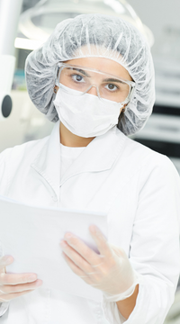 Careers: Bio/Medical: Employee with hair net and face mask