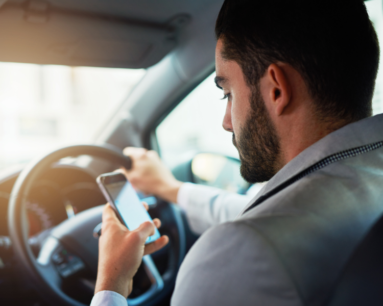 distracted person texting and driving
