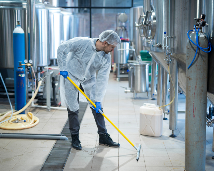 Worker cleaning a floor