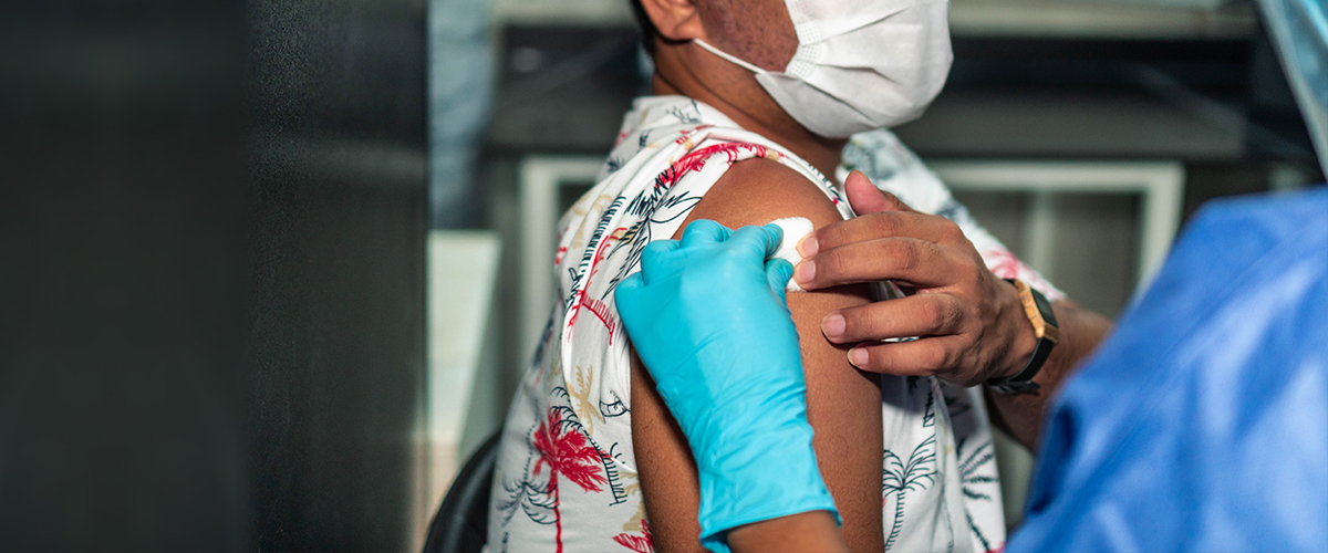 Man receiving vaccination