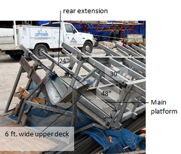 Figure 27 – Collapsed Mast scaffold deck lying on the ground upside down