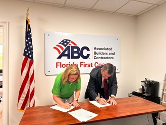 Left Standing – Karen Tucker Hoffman Right Standing - David (Scott) Tisdale, Jacksonville Area Director