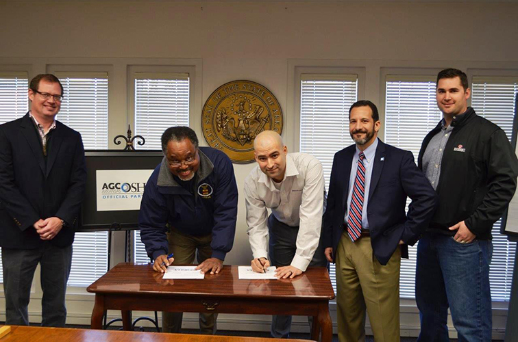 The U.S. Department of Labor Occupational Safety and Health Administration's Little Rock Area Office and the Arkansas Chapter of the Associated General Contractors of America renewed a strategic partnership Feb. 4. (From Left to right) Thomas Dickinson, AGC vice president and treasurer; Carlos Reynolds, OSHA's Little Rock Area Office director; Joe Morgan, AGC safety director; William Fletcher, AGC president; and Lance Wright, AGC field representative.)