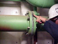 Figure 5: Marine chemist verifies that piping is secured