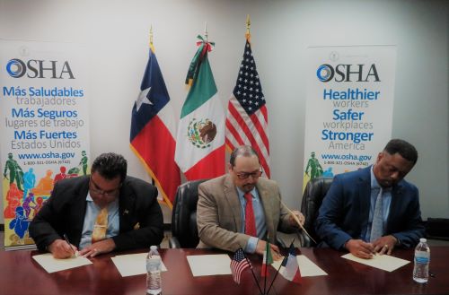 OSHA Dallas Area Director Basil Singh, Fort Worth Area Director Timothy Minor and Mexico’s Consul in Dallas Francisco de la Torre Galindo signing an alliance.