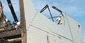 Photo courtesy of Cal/OSHA. This picture shows actual disaster site work conditions and may not illustrate proper safety and health procedures.