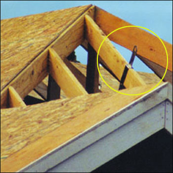 Figure 6 - A bolt-on anchor attached to a rafter. For problems with accessibility in using figures and illustrations, please contact the DOC at 202-693-2020.