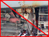 Improper practice - Figure 6: Scaffold planking extending more than 12 inches; improper unless it is secured to the supporting members