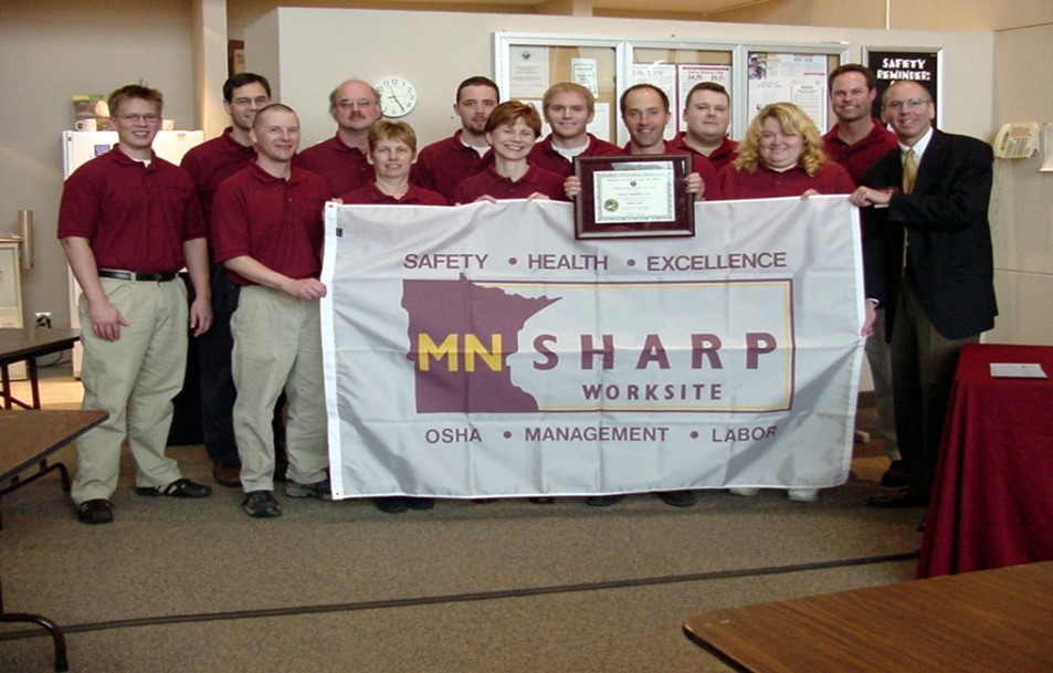 Safety Committee holding MN SHARP banner