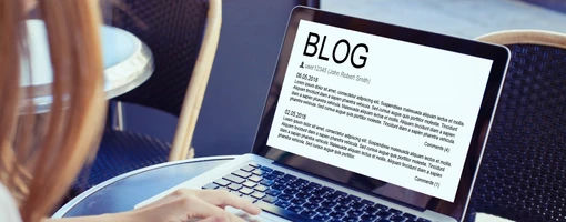 Notebook computer showing a blog on screen