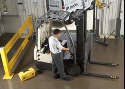 Figure 14. Preventive maintenance being performed on a forklift.