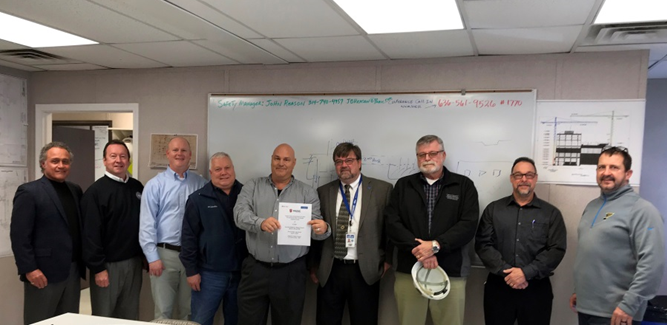 Gathering to announce their workplace safety and health partnership with OSHA are (from left): PARIC Corp. Senior Vice President Michael Rallo Sr.; Building & Construction Trades Council Executive Secretary/Treasurer John Stiffler; PARIC Senior Project Manager Nate Moore; The Cordish Companies Director of Construction Charlie Lee; PARIC Safety Director Shannon Niles; OSHA Area Director William McDonald; Eastern Missouri Laborers' District Council Business Manager, Special International Representative Gary Elliot; Carpenters Regional Council Safety Director/Trainer Barry Stelzer; and PARIC Project Director Tim Vaughan.