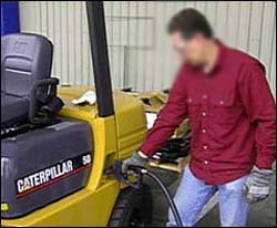 Figure 2. Operator refueling diesel-powered forklift.