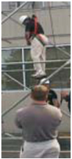 Figure 17. Worker suspended in harness prior to rescue.