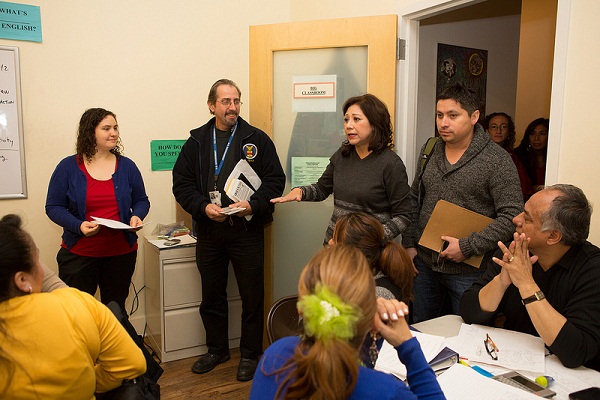 OSHA Region II Regional Administrator Robert Kulick (second from left) and Secretary Hilda L. Solis (center) visit hurricane victims and recovery workers in New York on Nov. 5, 2012.