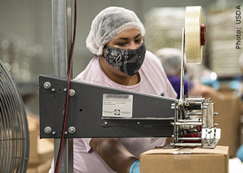 Photo of worker wearing face covering