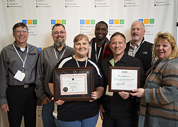Photograph of workers receiving award