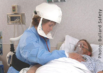 Photo of a healthcare worker wearing PAPR