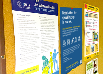 Safety posters displayed on wall