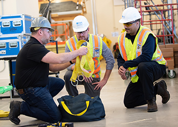 Workers participating in safety training