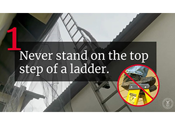 Person clibming ladder to rooftop - Never stand on the top step of a ladder