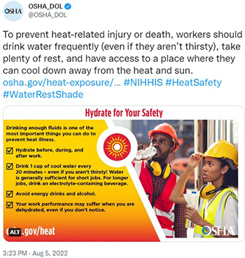 Construction workers taking a break to drink water.