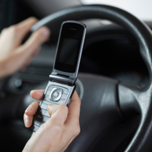Driver holding cellphone while driving