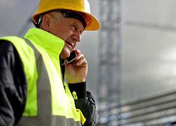 Worker using a cell phone