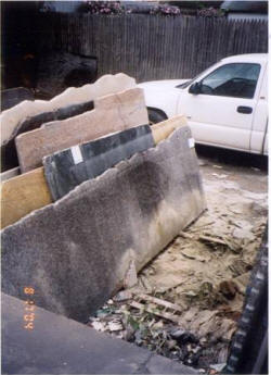 Debris preventing the complete insertion of the poles into a "slab rack." Debris preventing the complete insertion of the poles into a "slab rack."
